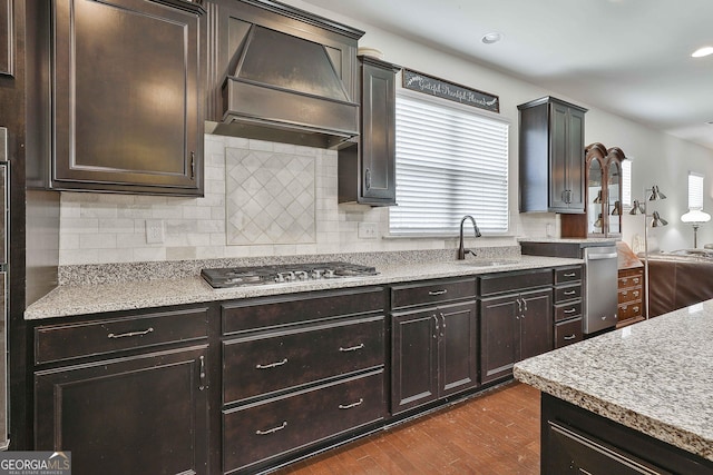 819 Firefly Ct, Griffin, GA 30223 - kitchen with premium range hood, stainless steel gas stovetop, plenty of natural light, dark wood finished floors, and recessed lighting