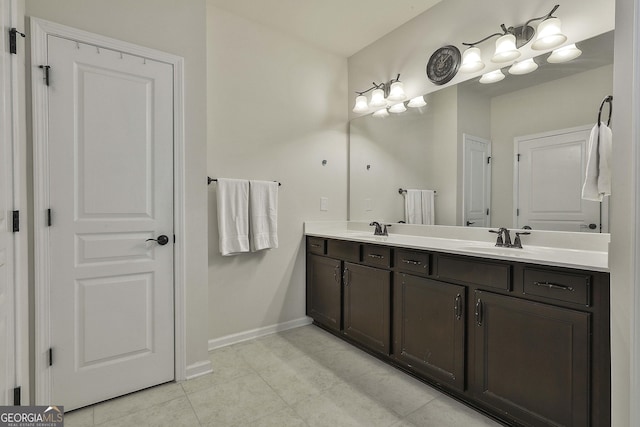 819 Firefly Ct, Griffin, GA 30223 - bathroom featuring double vanity and tile patterned floors