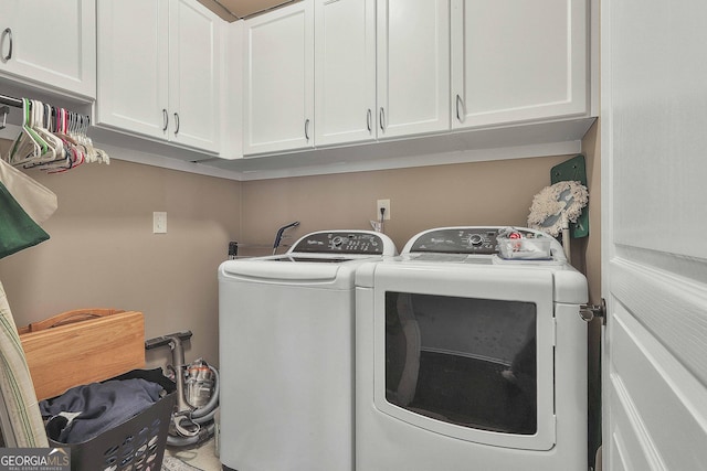 819 Firefly Ct, Griffin, GA 30223 - laundry room with independent washer and dryer and cabinet space
