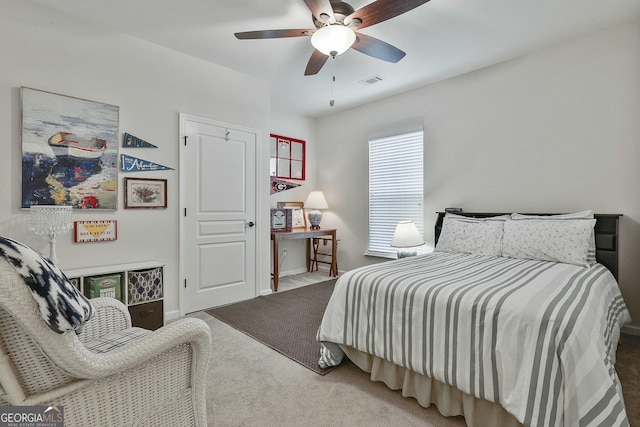 819 Firefly Ct, Griffin, GA 30223 - carpeted bedroom featuring a ceiling fan and baseboards