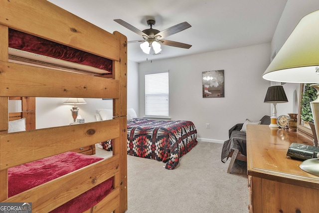 819 Firefly Ct, Griffin, GA 30223 - carpeted bedroom with baseboards and ceiling fan
