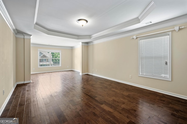 4540 Fourth Rail Ln, Cumming, GA 30040 - unfurnished room featuring a tray ceiling, crown molding, and dark wood-style floors