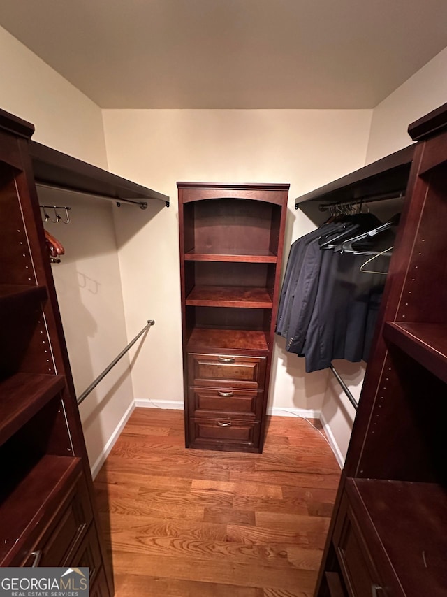 4265 Lansmoore, Suwanee, GA 30024 - spacious closet featuring light wood-type flooring