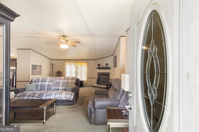 294 Birch Rd, Franklin, GA 30217 - carpeted living room with a ceiling fan and a glass covered fireplace