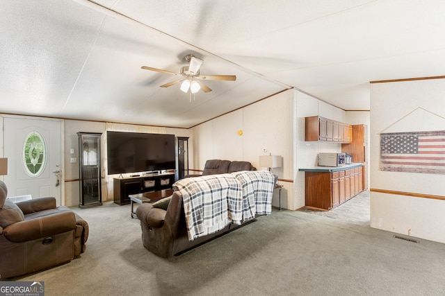 294 Birch Rd, Franklin, GA 30217 - living area with light colored carpet, ceiling fan, and vaulted ceiling