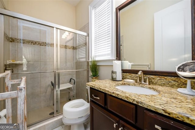 6110 Read Rd, Suwanee, GA 30024 - bathroom with vanity, toilet, and a stall shower