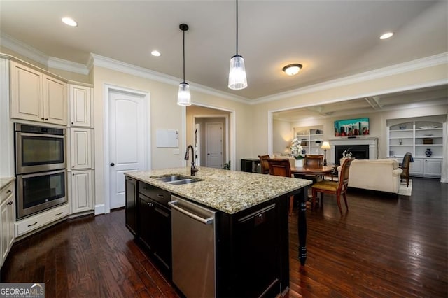 6110 Read Rd, Suwanee, GA 30024 - kitchen featuring a sink, appliances with stainless steel finishes, crown molding, dark wood-style floors, and a breakfast bar