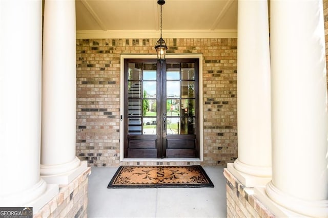 6110 Read Rd, Suwanee, GA 30024 - view of exterior entry featuring french doors and brick siding
