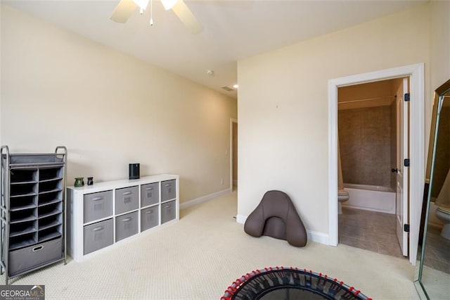 6110 Read Rd, Suwanee, GA 30024 - bedroom with baseboards, light colored carpet, ensuite bath, and ceiling fan