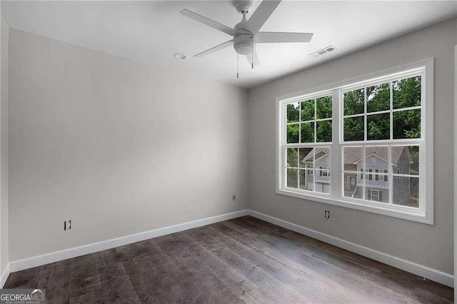 373 Lakecrest Cir SW, Calhoun, GA 30701 - spare room with baseboards, dark wood-style floors, and ceiling fan