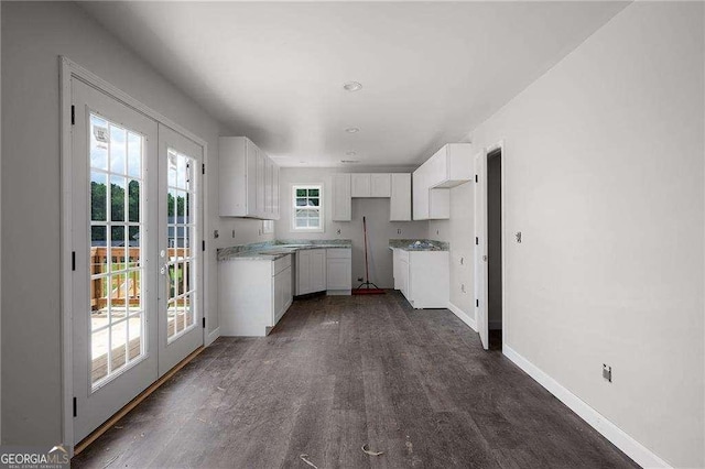 373 Lakecrest Cir SW, Calhoun, GA 30701 - kitchen featuring french doors, baseboards, white cabinetry, and dark wood finished floors