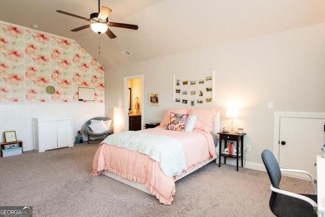 1032 Switchgrass Dr, Statham, GA 30666 - bedroom with lofted ceiling, carpet flooring, ceiling fan, a desk, and wainscoting