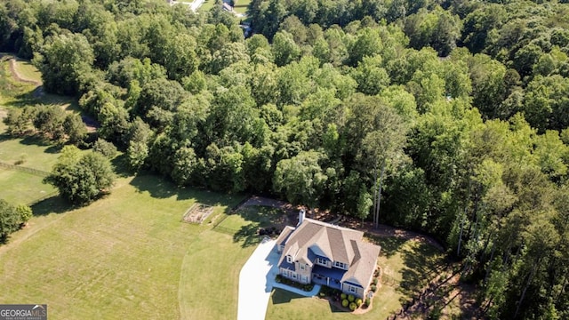 1032 Switchgrass Dr, Statham, GA 30666 - aerial view of property and surrounding area with a heavily wooded area