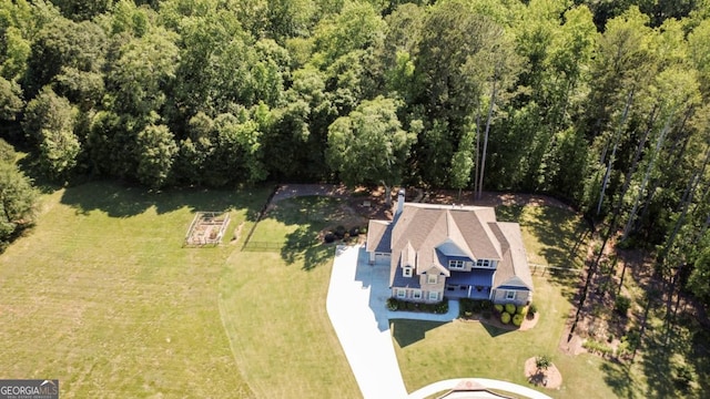 1032 Switchgrass Dr, Statham, GA 30666 - view of subject property with a heavily wooded area