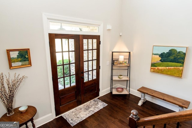 1032 Switchgrass Dr, Statham, GA 30666 - entrance foyer featuring french doors, dark wood finished floors, and plenty of natural light