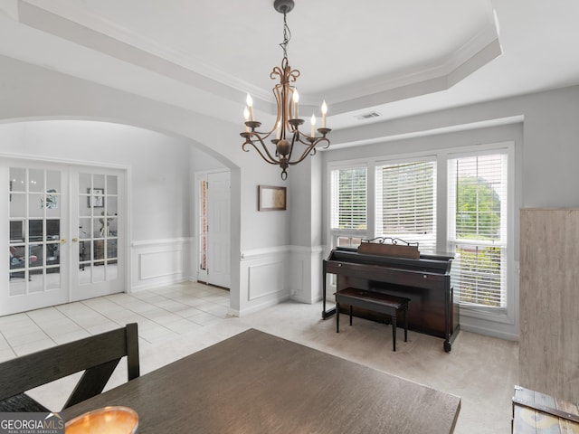 1613 Brolington Ct, Conyers, GA 30013 - sitting room with arched walkways, a chandelier, ornamental molding, wainscoting, and carpet floors