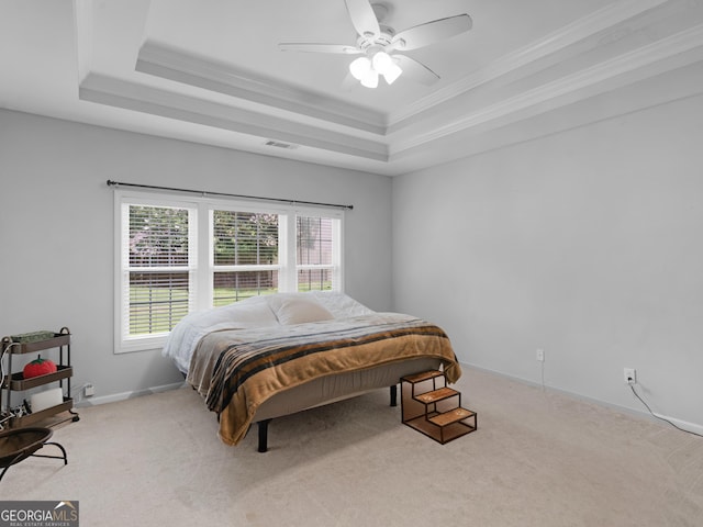 1613 Brolington Ct, Conyers, GA 30013 - bedroom featuring carpet, a raised ceiling, crown molding, and ceiling fan