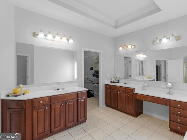 1613 Brolington Ct, Conyers, GA 30013 - bathroom featuring vanity, tile patterned flooring, and a raised ceiling