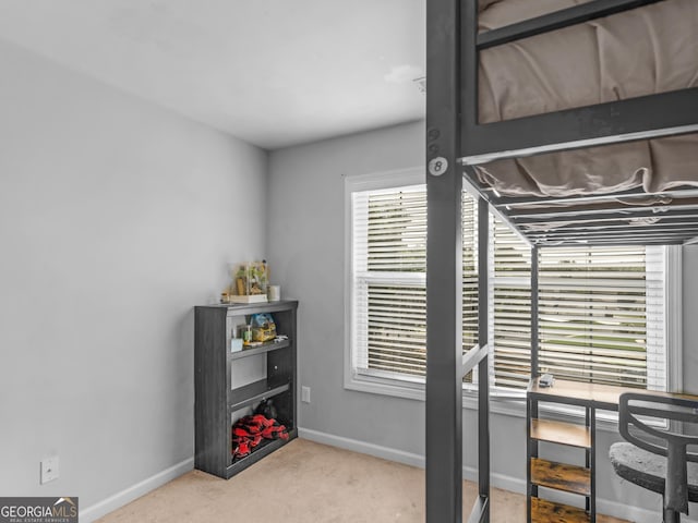 1613 Brolington Ct, Conyers, GA 30013 - carpeted bedroom with baseboards