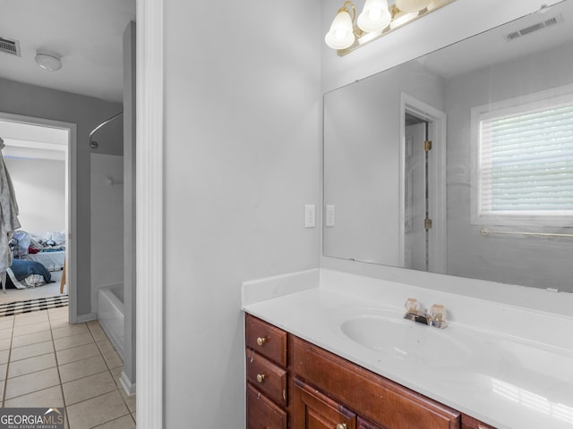 1613 Brolington Ct, Conyers, GA 30013 - full bath featuring vanity, tile patterned flooring, and shower / bath combination