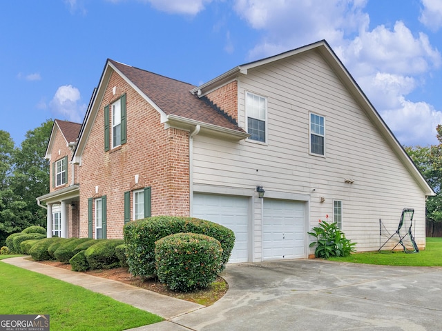 1613 Brolington Ct, Conyers, GA 30013 - view of side of property with brick siding, an attached garage, concrete driveway, roof with shingles, and a yard