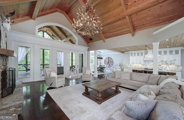177 Selfridge Rd, Mcdonough, GA 30252 - living area featuring a wooden ceiling with exposed beams, dark wood-type flooring, a chandelier, french doors, and high vaulted ceiling
