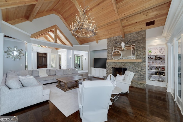 177 Selfridge Rd, Mcdonough, GA 30252 - living area featuring wood ceiling with exposed beams, a fireplace, high vaulted ceiling, a chandelier, and wood finished floors