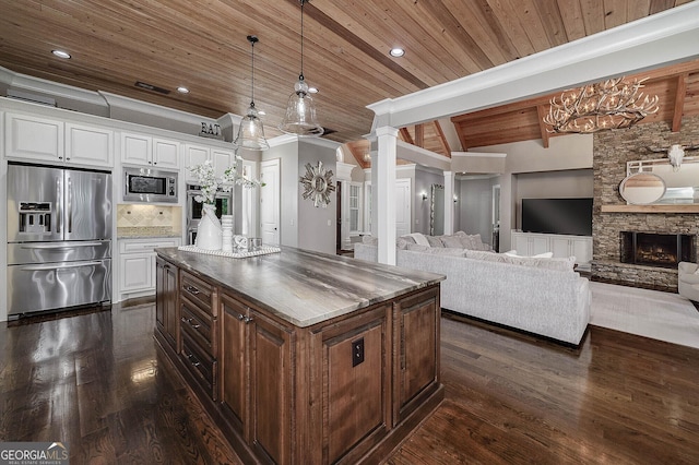 177 Selfridge Rd, Mcdonough, GA 30252 - kitchen featuring appliances with stainless steel finishes, wooden ceiling, white cabinetry, dark wood-type flooring, and backsplash