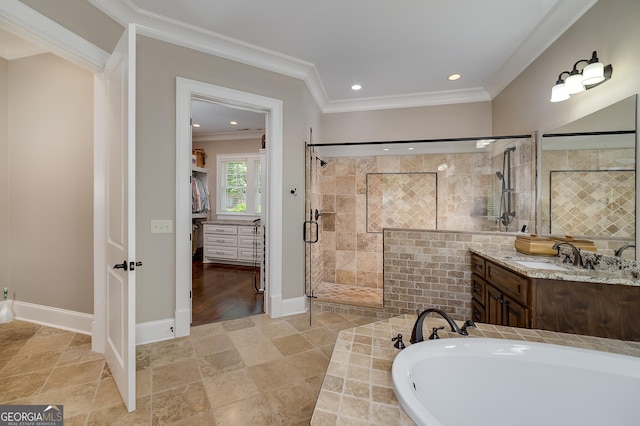 177 Selfridge Rd, Mcdonough, GA 30252 - full bathroom featuring a shower stall, ornamental molding, a bath, vanity, and recessed lighting