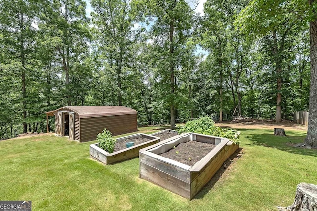 177 Selfridge Rd, Mcdonough, GA 30252 - view of green lawn featuring a garden and a storage unit