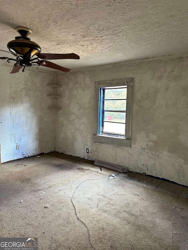 796 Shoemaker Rd, West Point, GA 31833 - empty room with ceiling fan and a textured ceiling