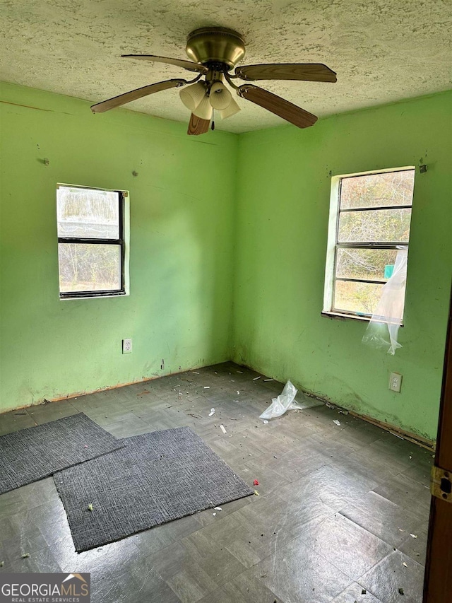 796 Shoemaker Rd, West Point, GA 31833 - empty room featuring a ceiling fan
