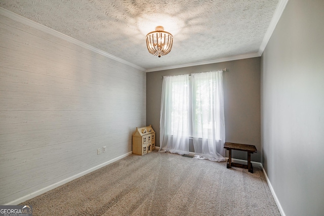 82 Post Oak Cir, Crawford, GA 30630 - unfurnished room with a textured ceiling, a chandelier, baseboards, crown molding, and carpet flooring