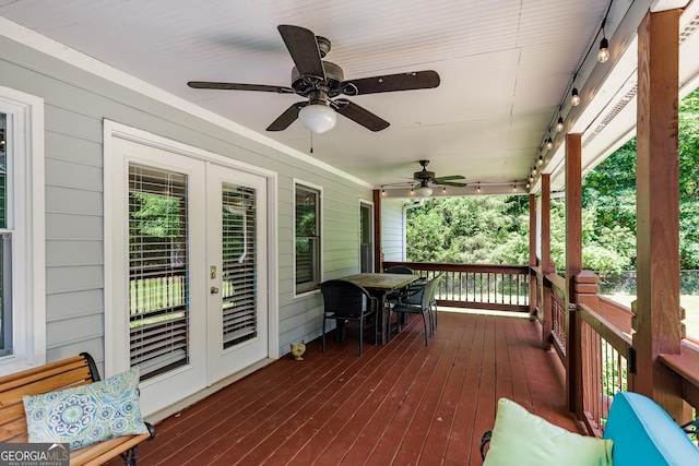 82 Post Oak Cir, Crawford, GA 30630 - wooden deck with french doors, ceiling fan, and outdoor dining space