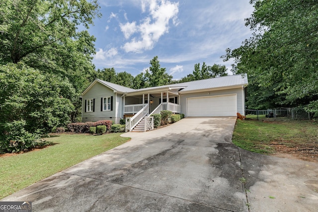 82 Post Oak Cir, Crawford, GA 30630 - ranch-style house with covered porch, stairs, concrete driveway, an attached garage, and crawl space