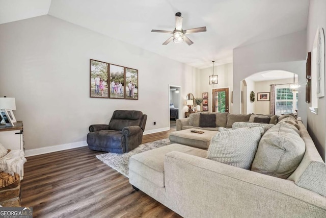 76 Lightning Rdg, Dawsonville, GA 30534 - living area featuring a ceiling fan, arched walkways, dark wood finished floors, baseboards, and a chandelier