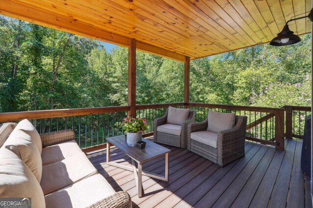 76 Lightning Rdg, Dawsonville, GA 30534 - wooden terrace with outdoor lounge area and a view of trees