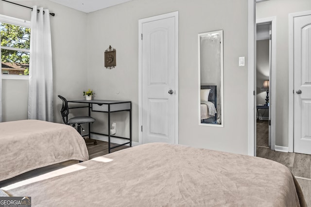 3182 Willow Creek Rd, Augusta, GA 30909 - bedroom with wood finished floors and baseboards