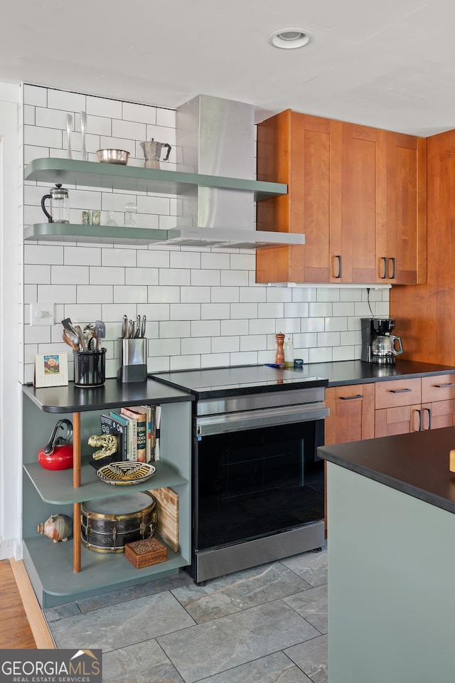 278 Fourth St, Athens, GA 30601 - kitchen with open shelves, stainless steel electric range, dark countertops, decorative backsplash, and brown cabinets