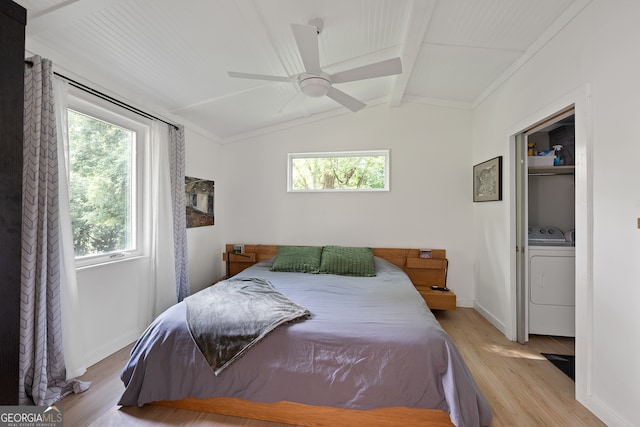 278 Fourth St, Athens, GA 30601 - bedroom with washer / dryer, light wood-style flooring, multiple windows, and baseboards