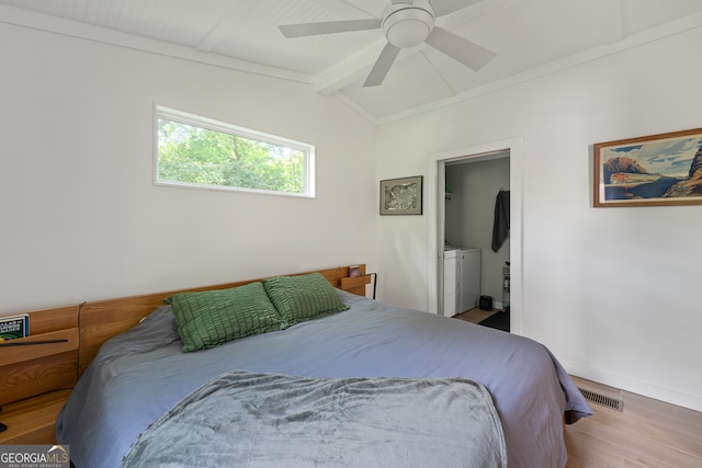 278 Fourth St, Athens, GA 30601 - bedroom with wood finished floors, separate washer and dryer, baseboards, and ceiling fan