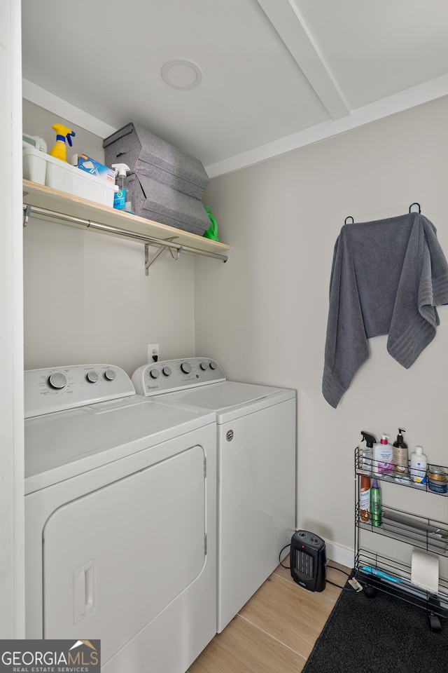 278 Fourth St, Athens, GA 30601 - laundry room with washing machine and dryer and light wood-style floors