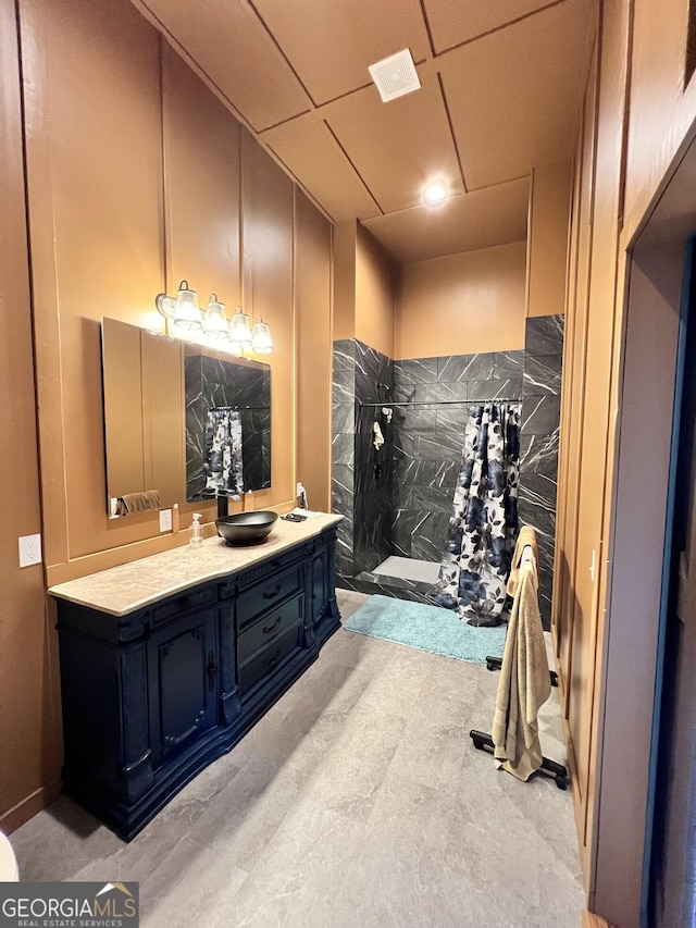 1048 Whites Mill Rd, Valley, AL 36854 - bathroom featuring vanity and tiled shower