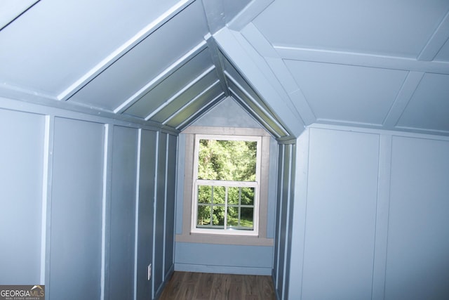 1048 Whites Mill Rd, Valley, AL 36854 - additional living space with lofted ceiling, dark wood-type flooring, and a decorative wall