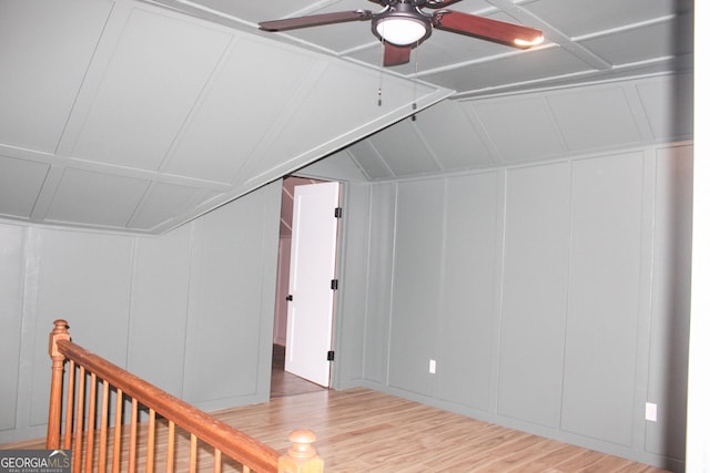 1048 Whites Mill Rd, Valley, AL 36854 - additional living space featuring a decorative wall, ceiling fan, wood finished floors, and vaulted ceiling