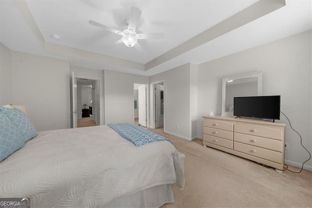 397 Cypher Dr, Suwanee, GA 30024 - bedroom featuring a raised ceiling, light colored carpet, and a ceiling fan