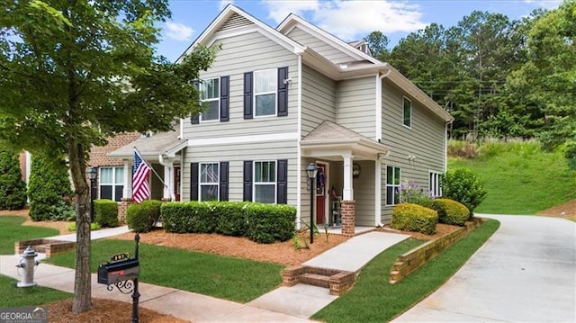 397 Cypher Dr, Suwanee, GA 30024 - view of front of house with a front yard