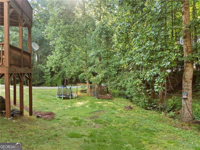 9410 Brooke Cove Ct, Gainesville, GA 30506 - view of green lawn with a deck