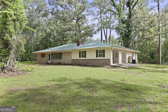 2317 Ga Highway 24, Statesboro, GA 30461 - single story home with brick siding, a front lawn, and a metal roof