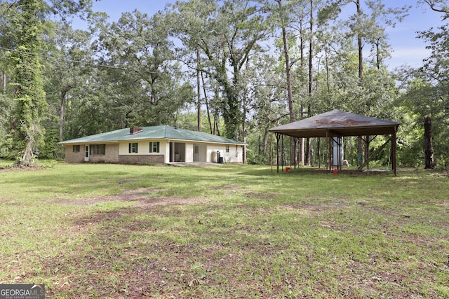2317 Ga Highway 24, Statesboro, GA 30461 - view of grassy yard featuring a carport